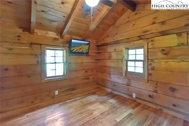 a view of empty room with windows