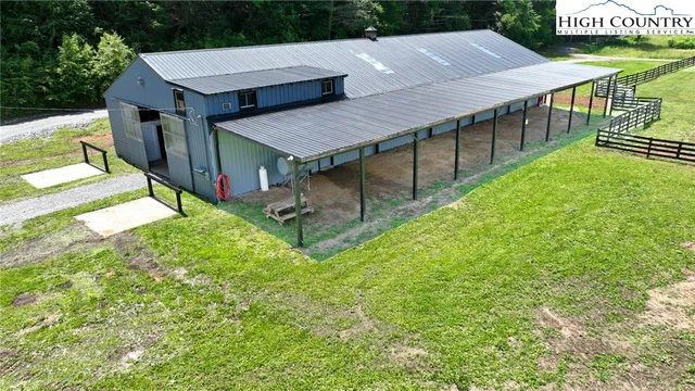 an aerial view of a house having yard