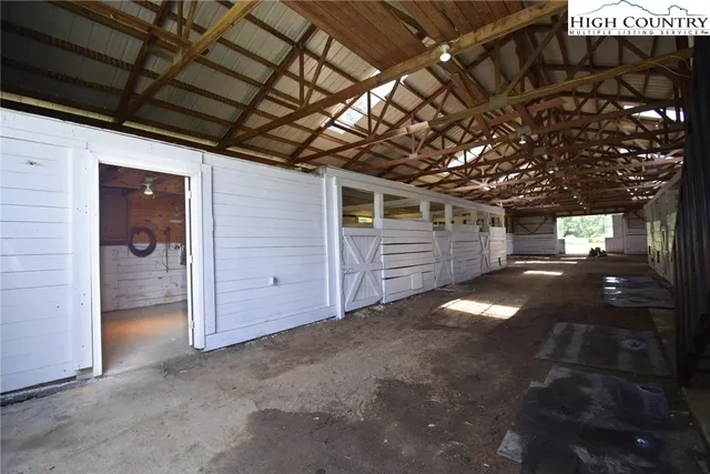 a view of a city with lush green forest