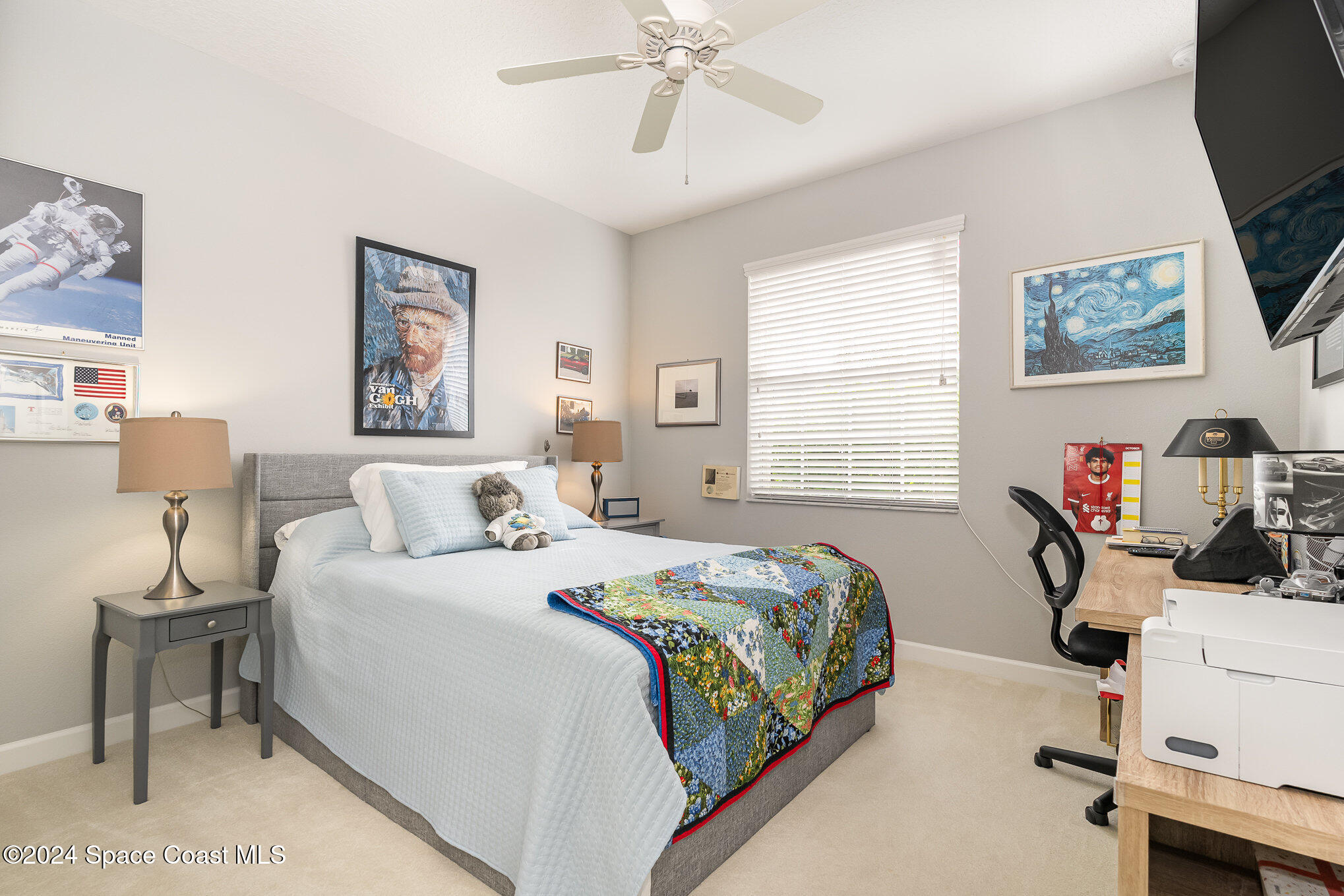3354 Sansome Circle Melbourne, FL 32940 - Photo 20 of 81 a bedroom with a bed and a chandelier
