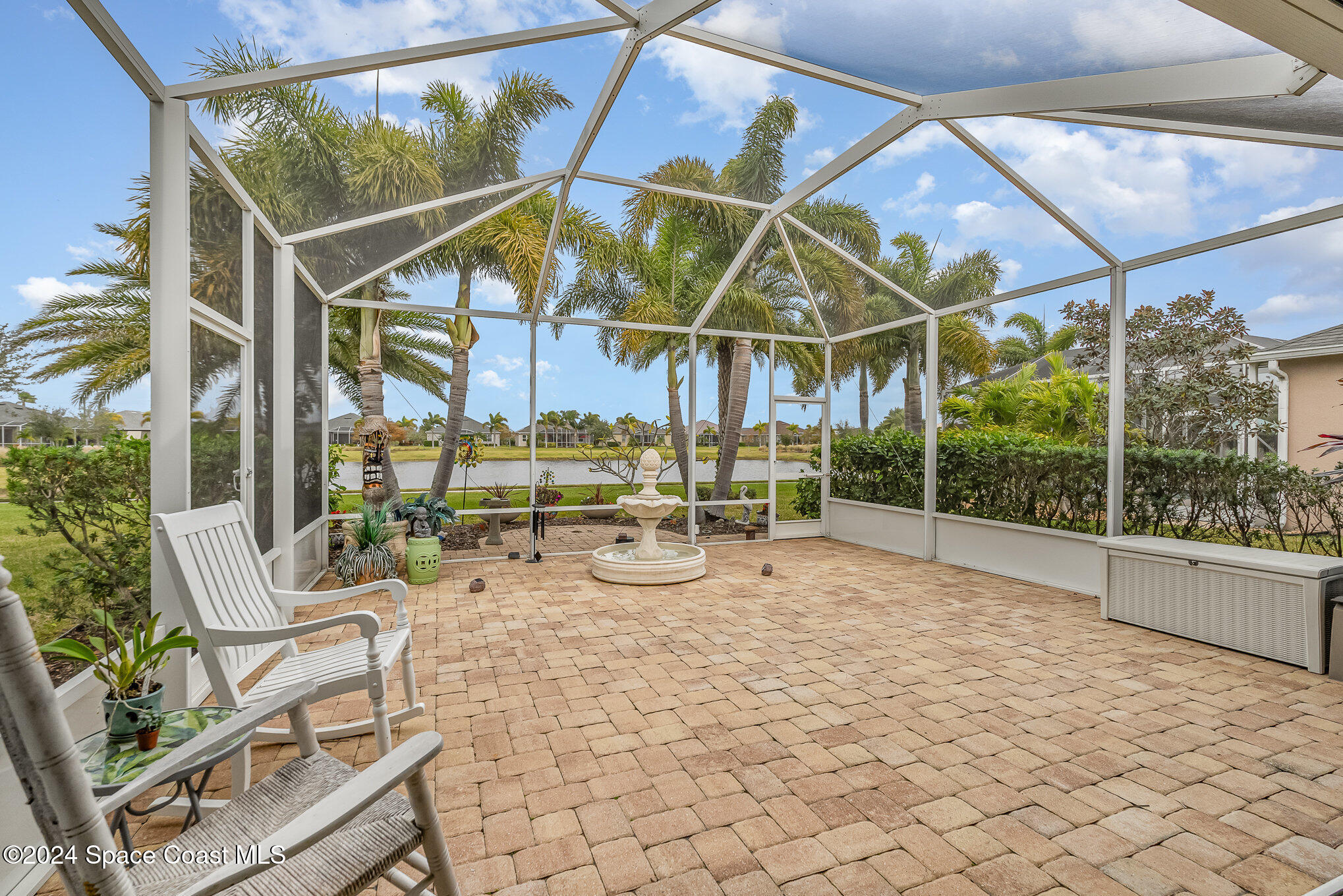 3354 Sansome Circle Melbourne, FL 32940 - Photo 23 of 81 a view of a room with wooden floor and iron stairs