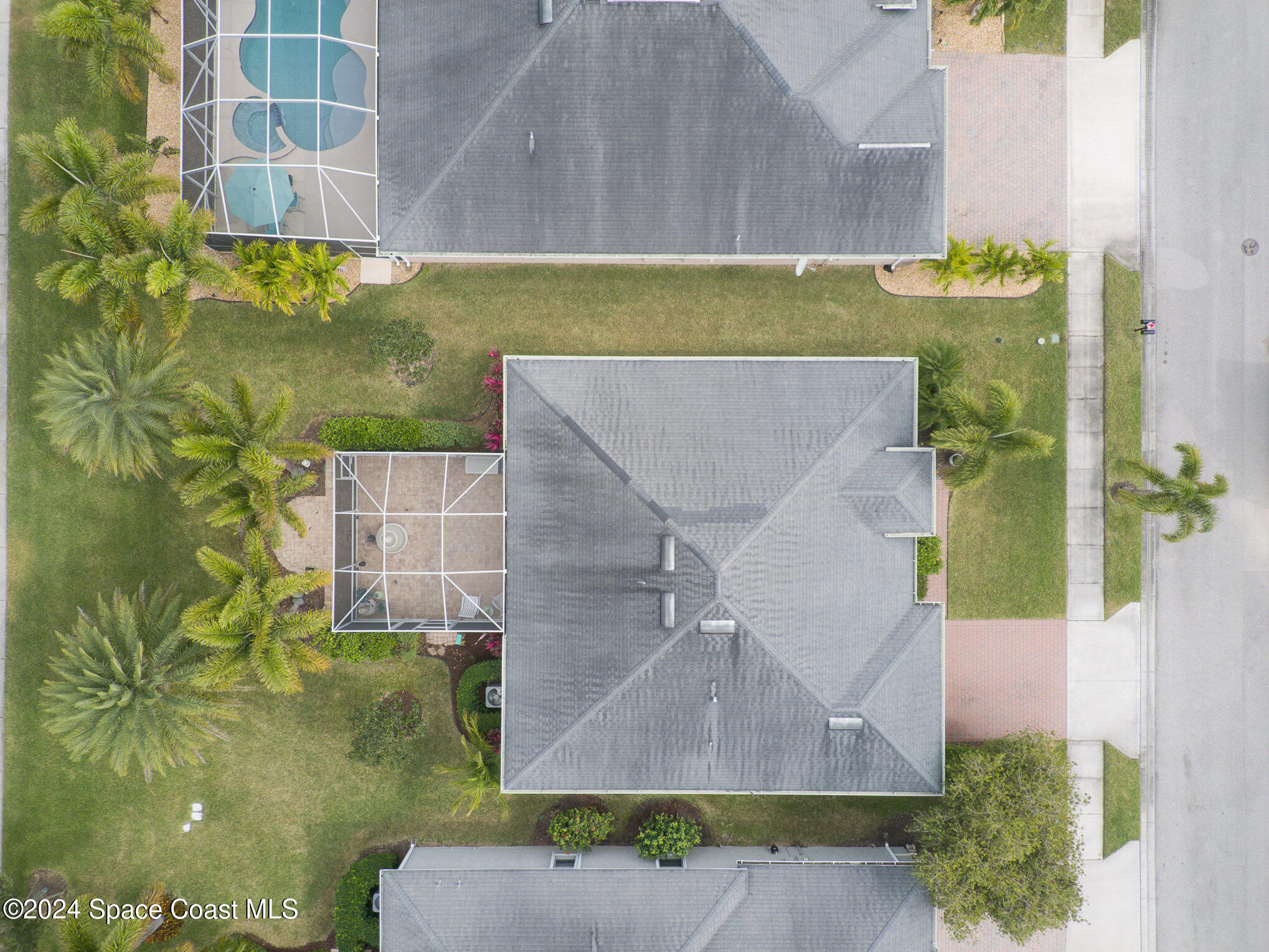 3354 Sansome Circle Melbourne, FL 32940 - Photo 27 of 81 an aerial view of a house with a yard