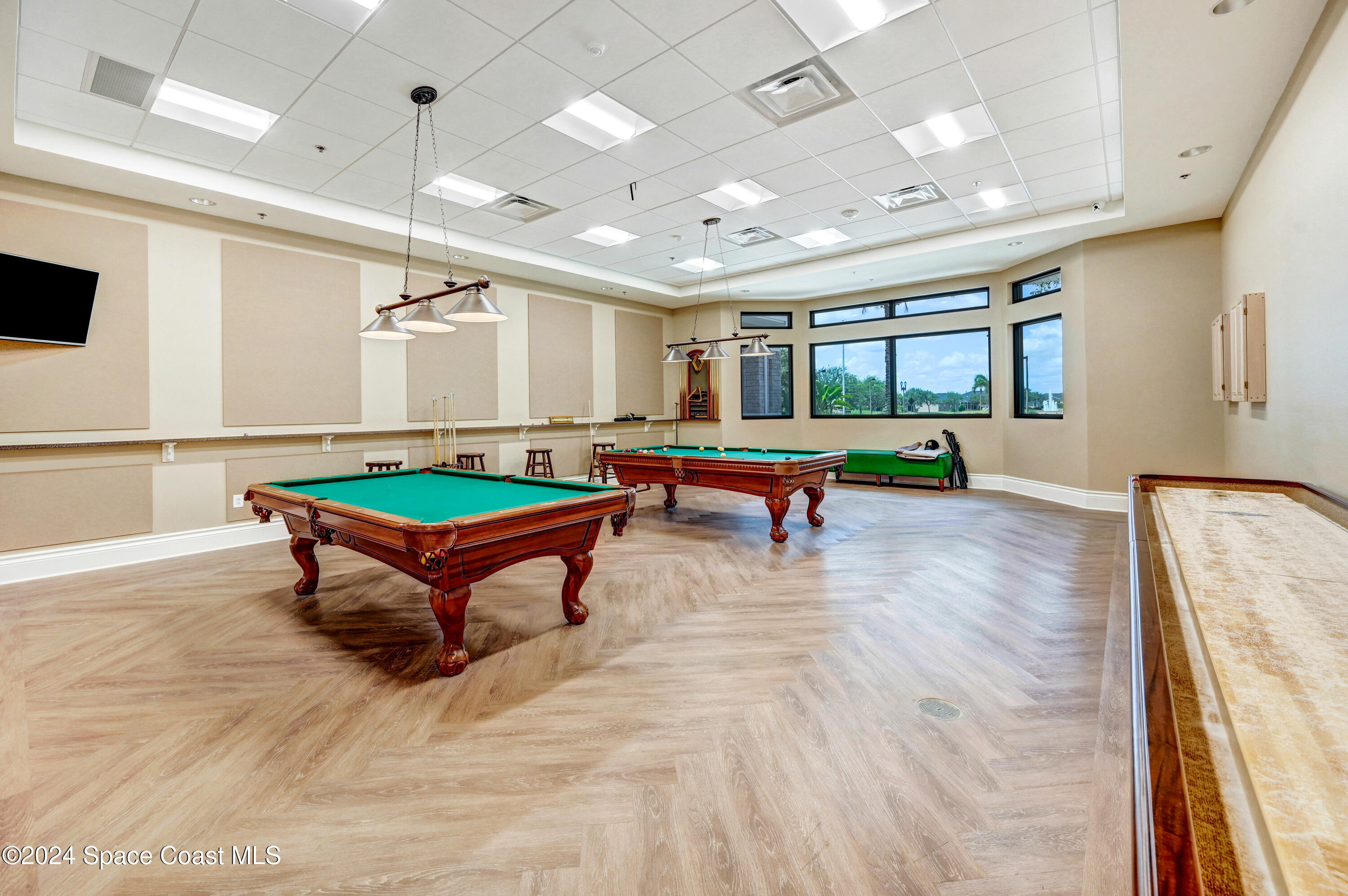 3354 Sansome Circle Melbourne, FL 32940 - Photo 43 of 81 a living room with furniture pool table and a flat screen tv