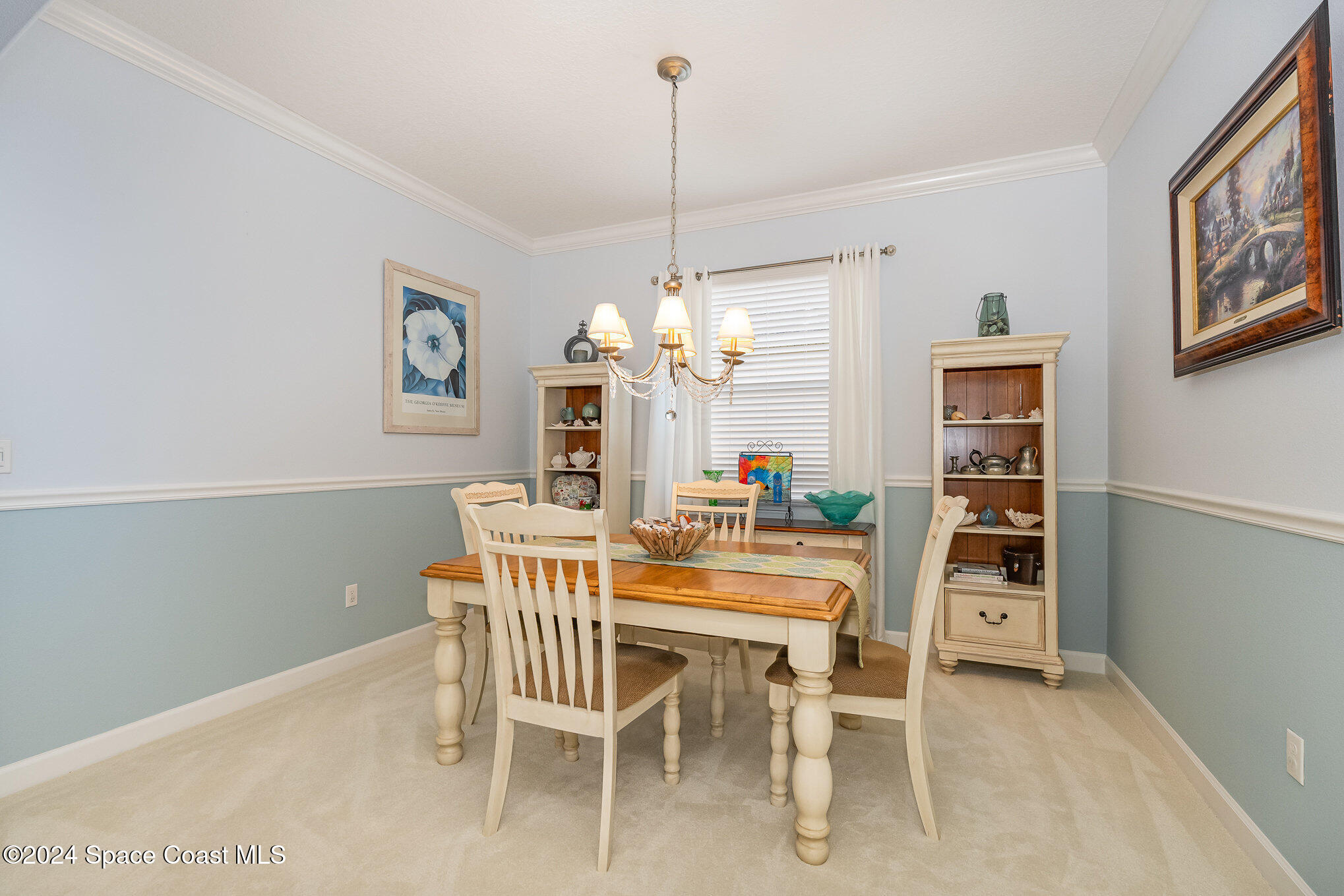 3354 Sansome Circle Melbourne, FL 32940 - Photo 7 of 81 a dining room with furniture and window