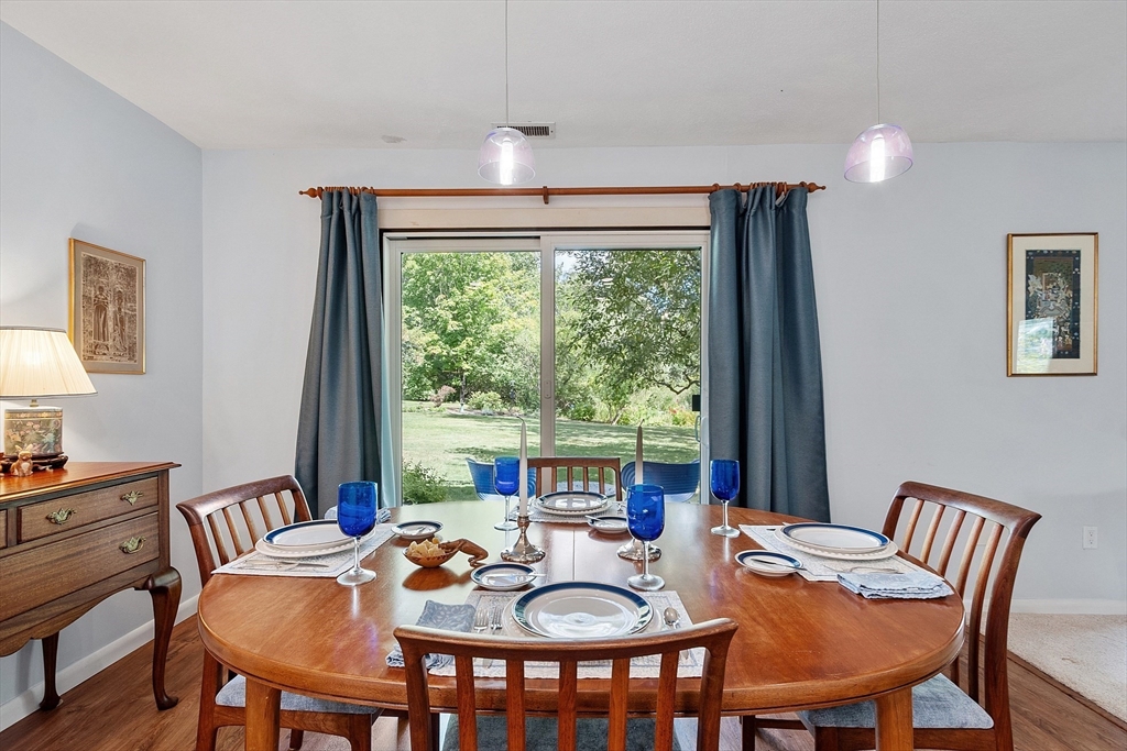 1 Concord Greene, Unit 7 Concord, MA 01742 - Photo 9 of 31 a view of a dining room with furniture window and outside view