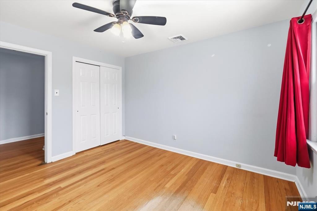 922 Wildwood Road Oradell, NJ 07649 - Photo 20 of 42 a view of a room with wooden floor and door