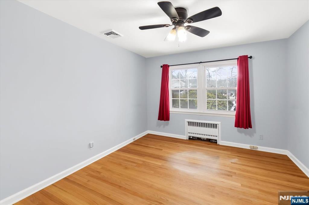 922 Wildwood Road Oradell, NJ 07649 - Photo 21 of 42 a view of an empty room with a window