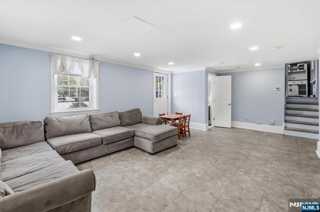 922 Wildwood Road Oradell, NJ 07649 - Photo 24 of 42 a living room with furniture and a large window