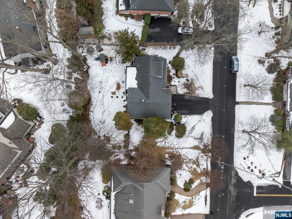 922 Wildwood Road Oradell, NJ 07649 - Photo 40 of 42 with a vase of flowers sitting on a table