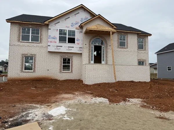 a view of a front of house with a yard