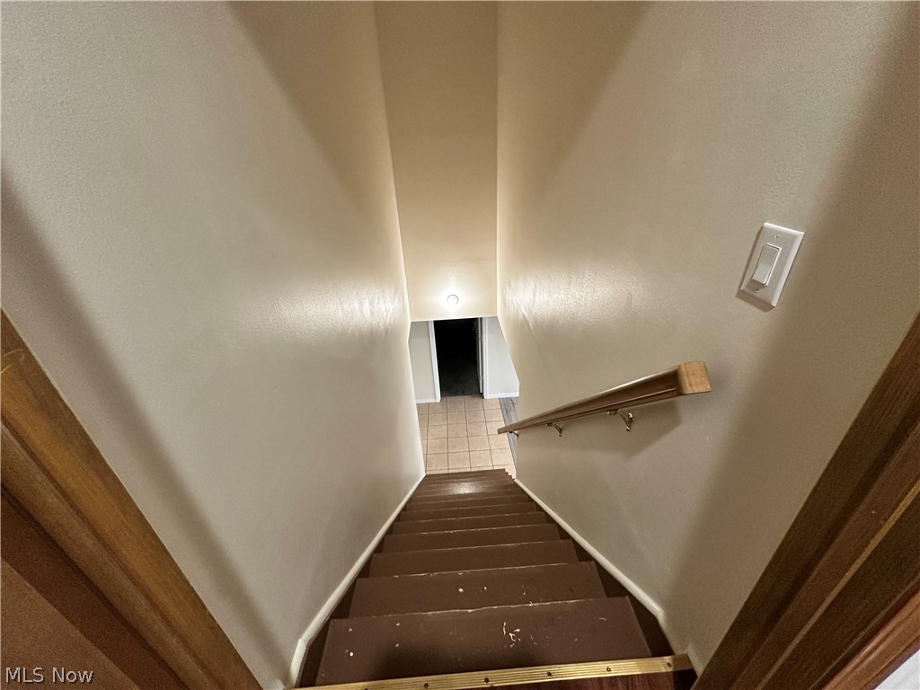 17437 Early Cemetary Road Newcomerstown, OH 43832 - Photo 42 of 49 stairs leading to finished basement