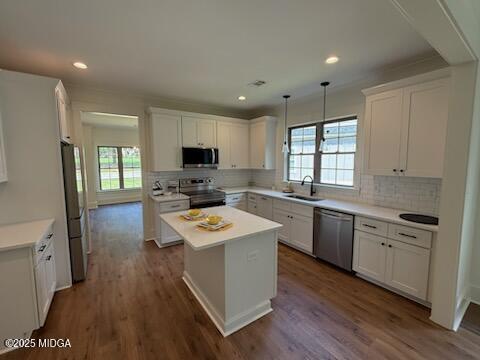 418 Cliffstone Court Macon, GA 31220 - Photo 2 of 11 a kitchen with cabinets wooden floor and stainless steel appliances