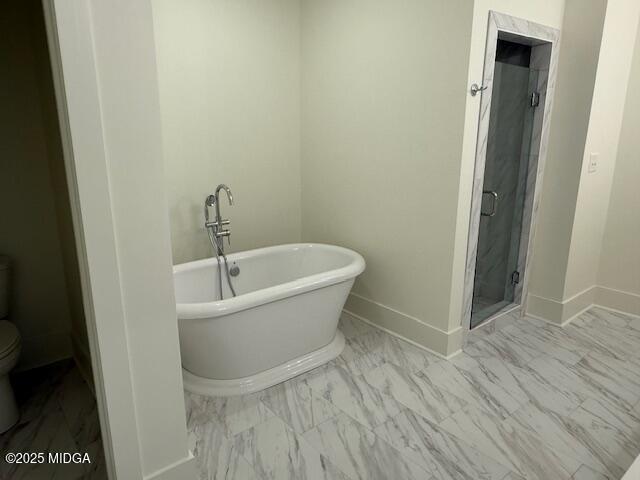 418 Cliffstone Court Macon, GA 31220 - Photo 6 of 11 a white bath tub sitting in a bathroom