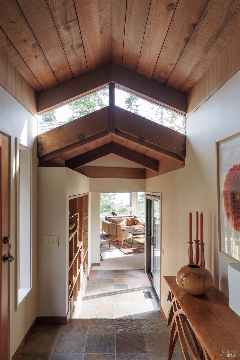 35925 Seaward Reach The Sea Ranch, CA 95497 - Photo 10 of 38 Architectural hallway leading to light filled Living Room with ocean and garden views.