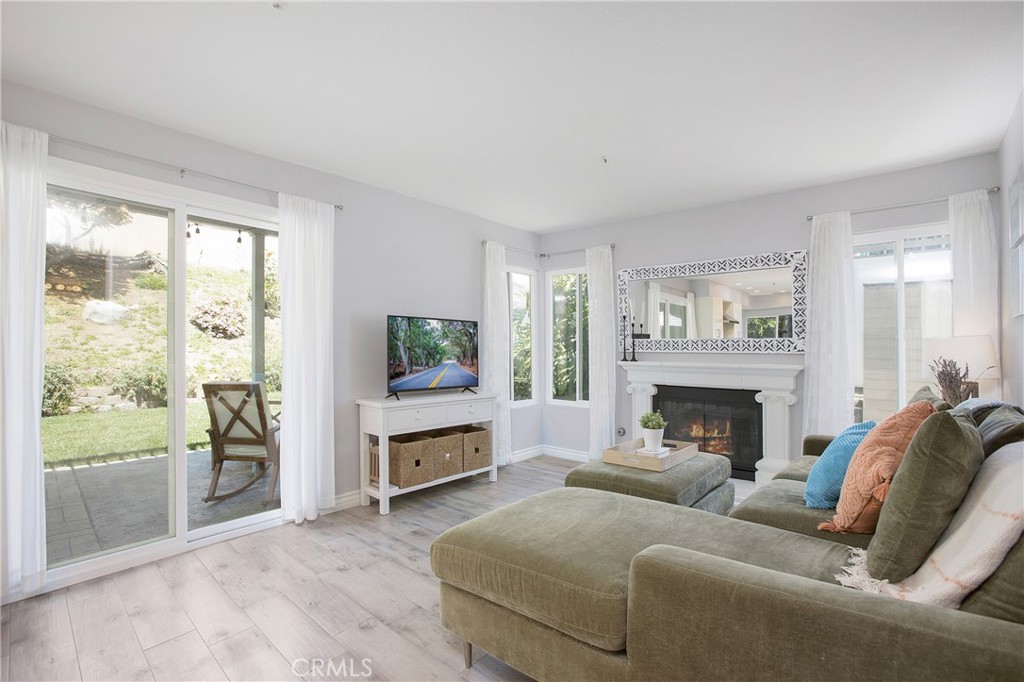2865 Riachuelo San Clemente, CA 92673 - Photo 11 of 35 a living room with furniture and a fireplace