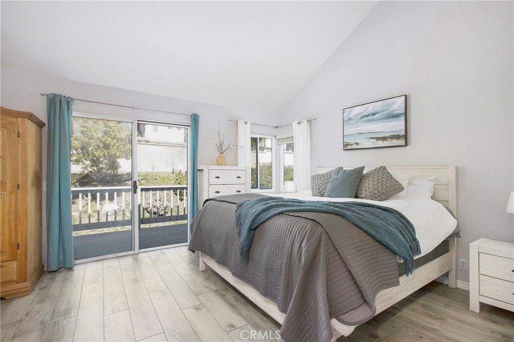 2865 Riachuelo San Clemente, CA 92673 - Photo 16 of 35 a spacious bedroom with a bed and a large window