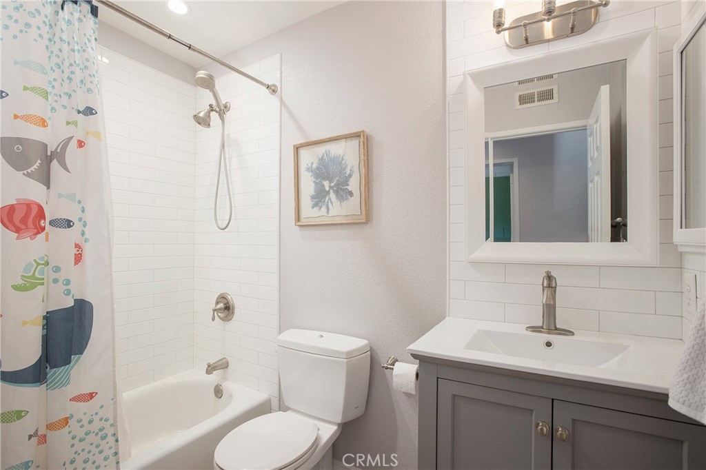 2865 Riachuelo San Clemente, CA 92673 - Photo 22 of 35 a bathroom with a sink toilet and shower