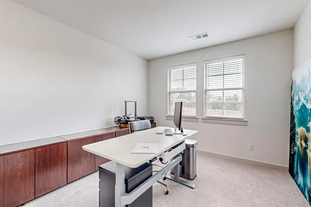a bathroom with a granite countertop sink double and mirror