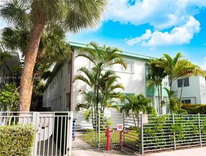 a view of balcony with palm trees