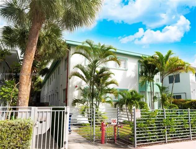 a view of balcony with palm trees