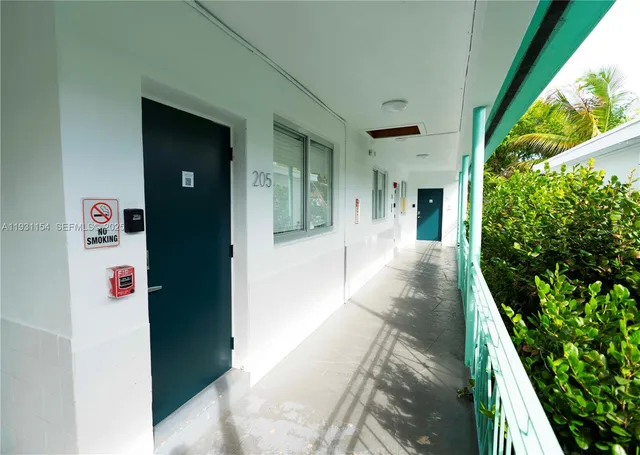 a view of a hallway with staircase