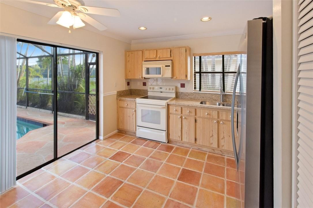 19554 Sea Pines Way Boca Raton, FL 33498 - Photo 12 of 26 a spacious bathroom with a shower a sink and a mirror