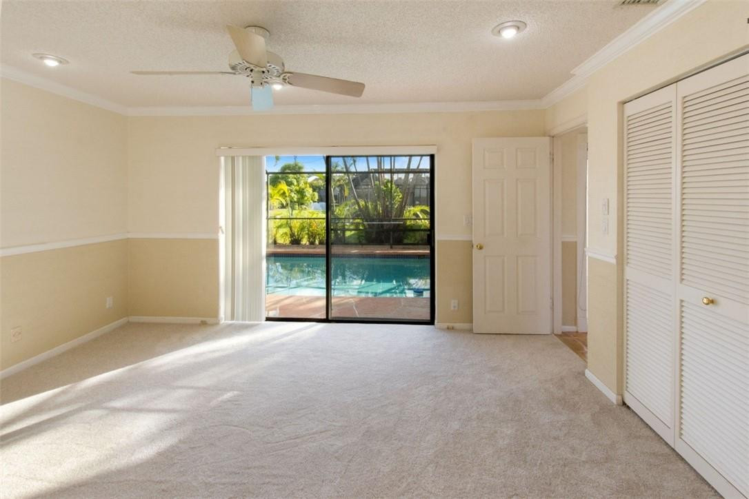 19554 Sea Pines Way Boca Raton, FL 33498 - Photo 18 of 26 a view of an empty room with a window