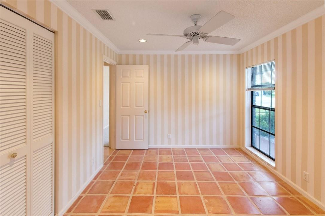 19554 Sea Pines Way Boca Raton, FL 33498 - Photo 19 of 26 a view of an empty room with a window