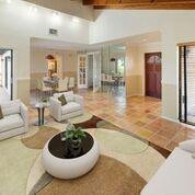 19554 Sea Pines Way Boca Raton, FL 33498 - Photo 9 of 26 a living room with a couch and a large window