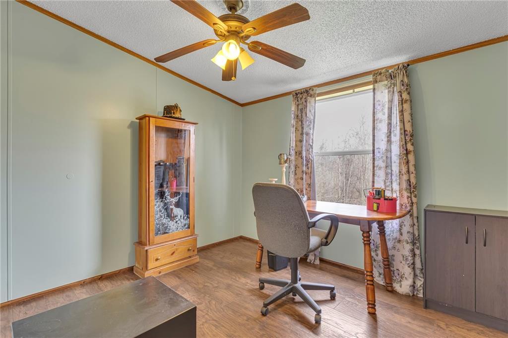 204 Hollowvue Road Wampum, PA 16157 - Photo 17 of 39 a view of a workspace with furniture and a window