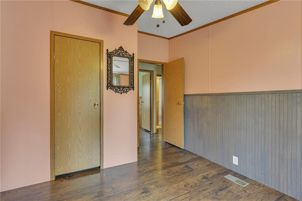 204 Hollowvue Road Wampum, PA 16157 - Photo 20 of 39 a view of a hallway with wooden floor