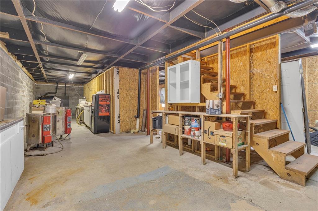 204 Hollowvue Road Wampum, PA 16157 - Photo 24 of 39 a view of a storage room with shelves