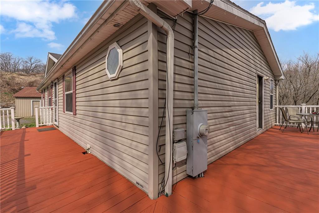 204 Hollowvue Road Wampum, PA 16157 - Photo 25 of 39 a view of a house with a backyard