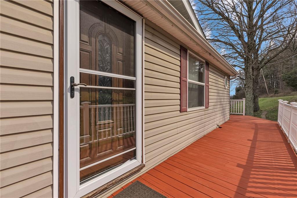 204 Hollowvue Road Wampum, PA 16157 - Photo 27 of 39 a backyard of a house with seating space