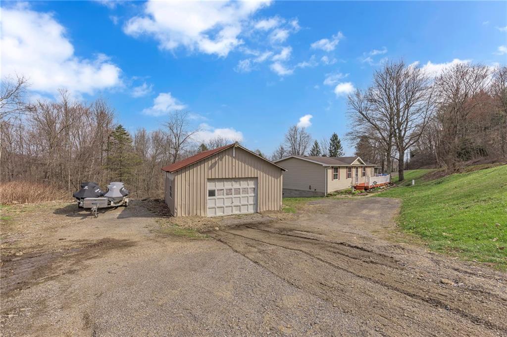 204 Hollowvue Road Wampum, PA 16157 - Photo 3 of 39 a view of a house with a yard