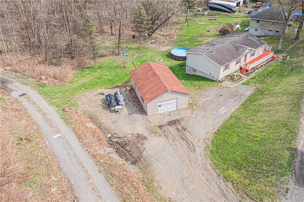204 Hollowvue Road Wampum, PA 16157 - Photo 32 of 39 an aerial view of a house with outdoor space