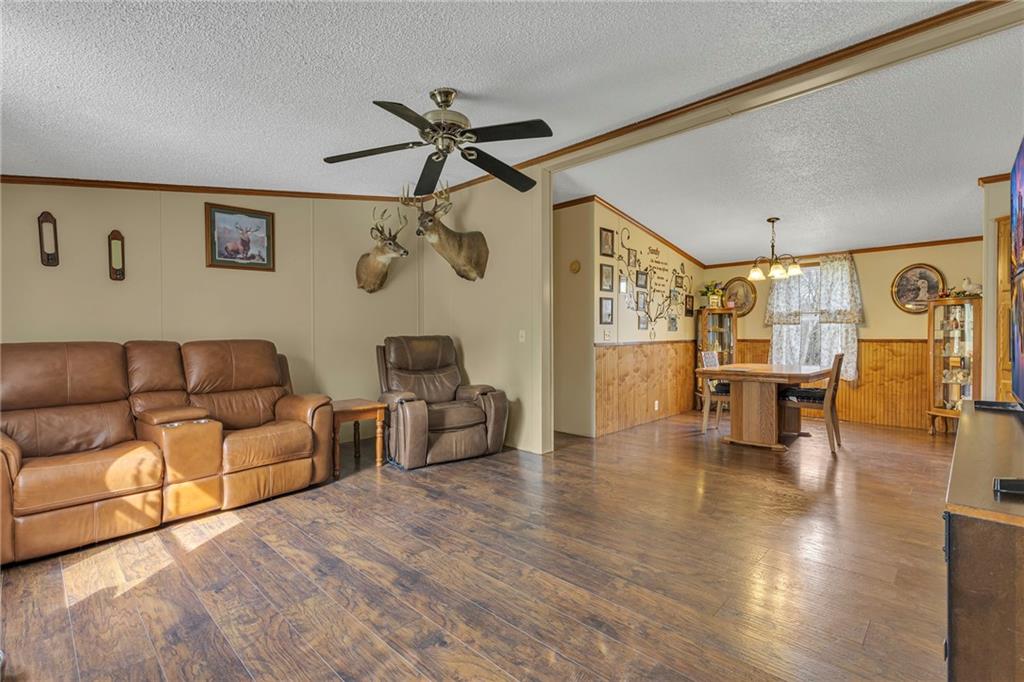 204 Hollowvue Road Wampum, PA 16157 - Photo 6 of 39 a living room with furniture and a large window