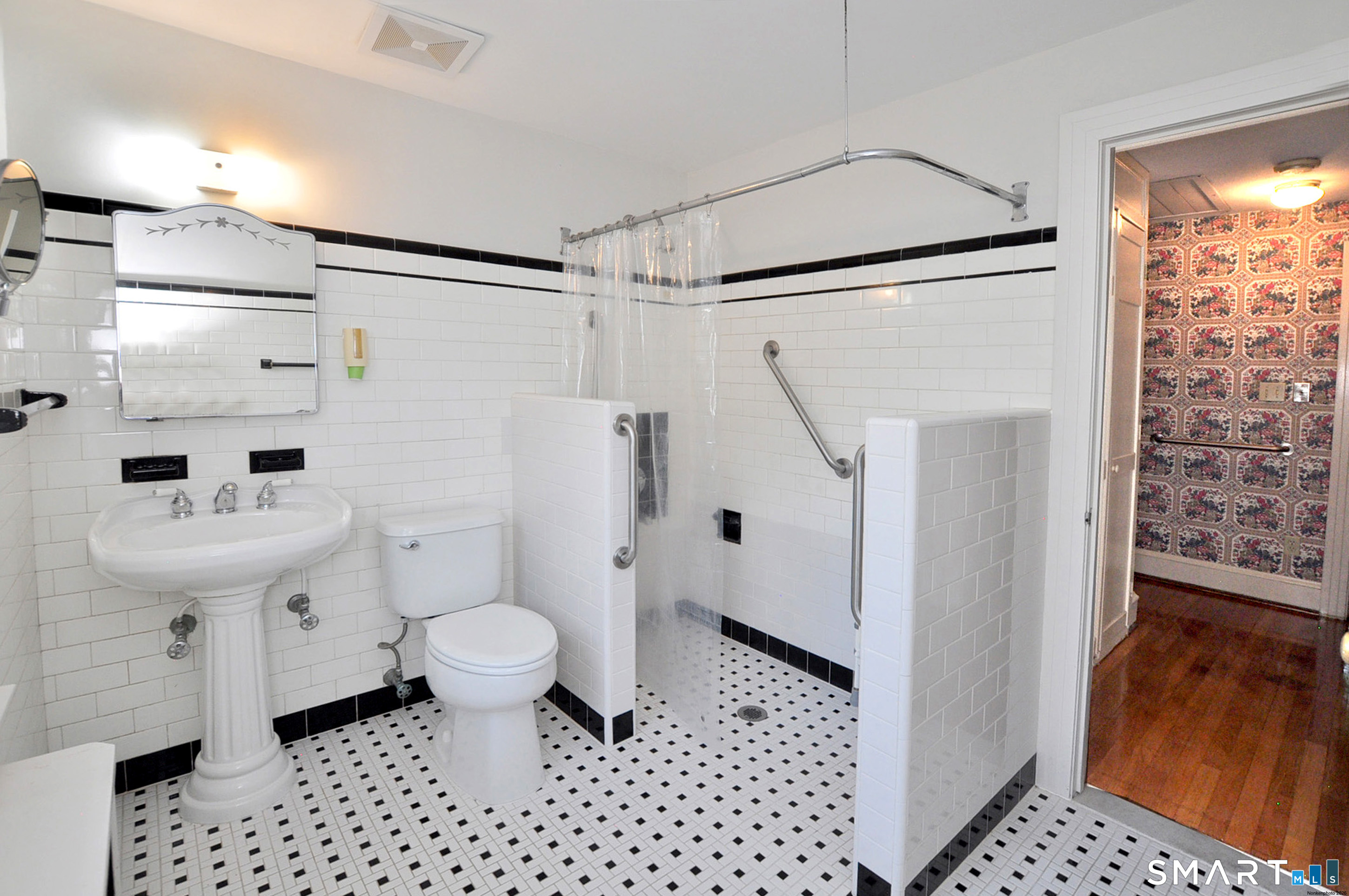 10 Harvey Road Windsor, CT 06095 - Photo 27 of 36 a bathroom with a sink toilet and shower