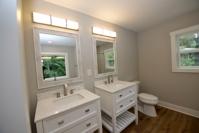 317 Pendleton Road Clemson, SC 29631 - Photo 23 of 36 Dual vanities with elegant fixtures define this well-appointed bathroom space.
