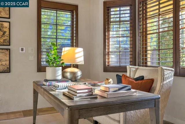 a view of a dining room with furniture window and outside view