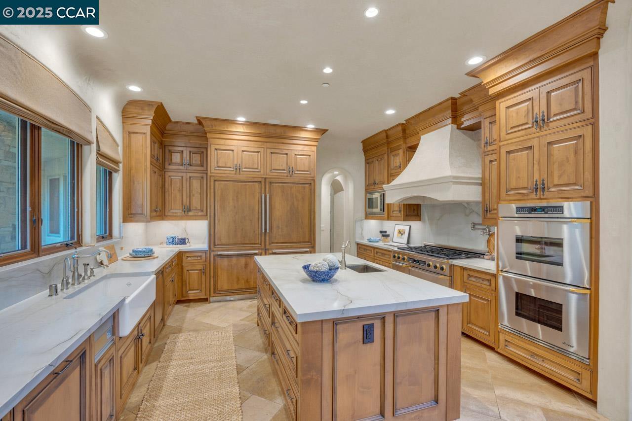 104 Muir Lane Alamo, CA 94507 - Photo 17 of 54 a view of a kitchen with a sink and microwave