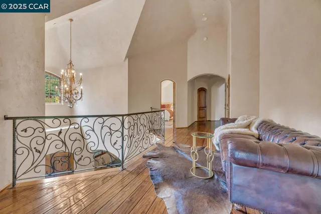 a bed room with a bed and a television