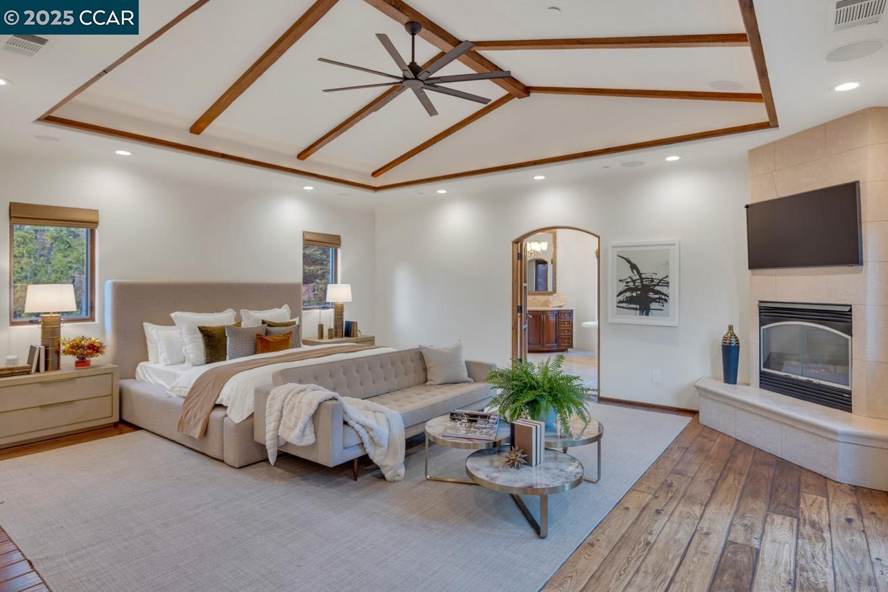 104 Muir Lane Alamo, CA 94507 - Photo 25 of 54 a bed room with a bed and a television