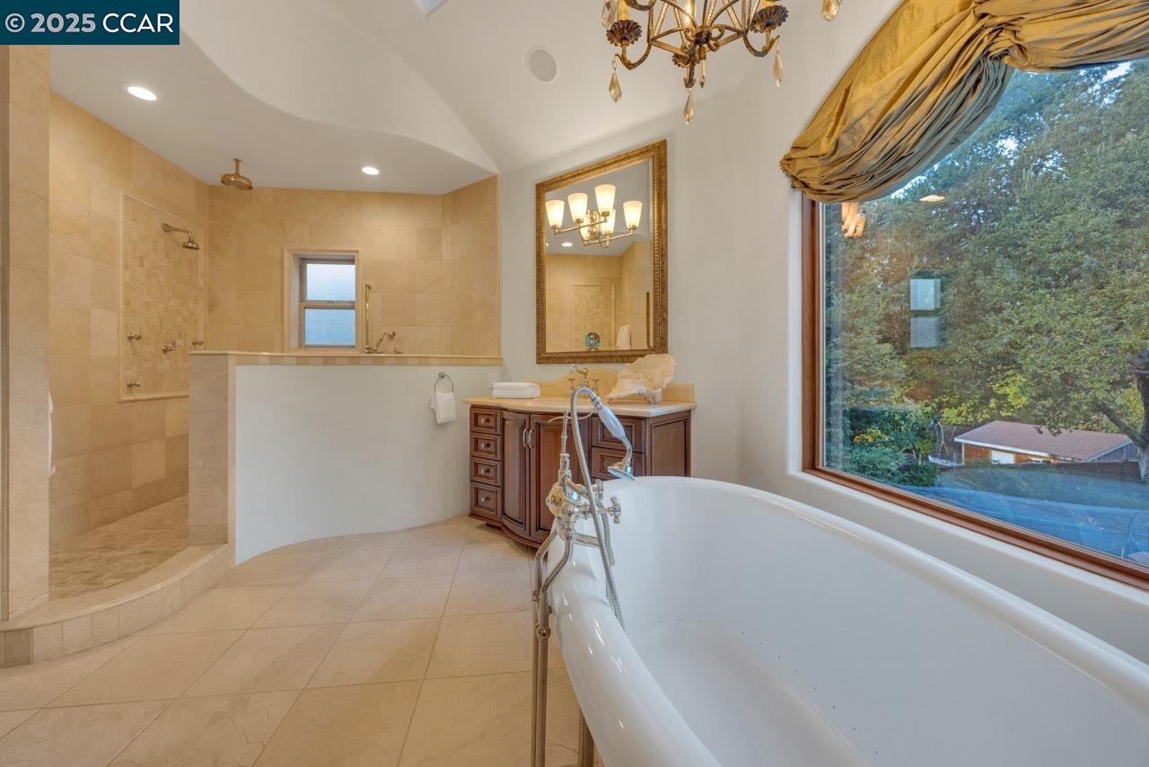 104 Muir Lane Alamo, CA 94507 - Photo 30 of 54 a view of a bathroom with a bathtub and shower