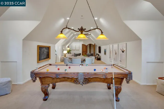 a view of a room with shelves on the wall