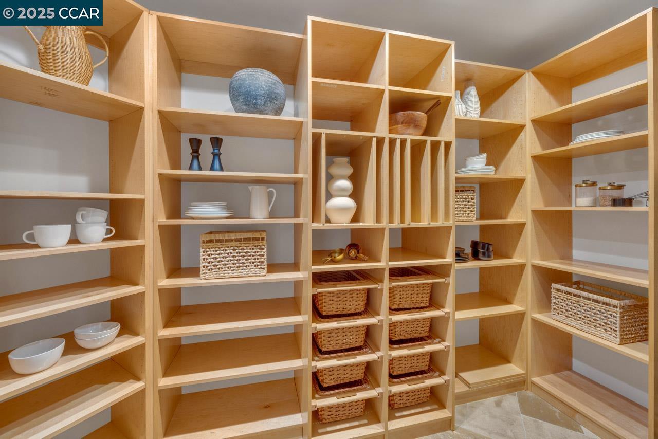 104 Muir Lane Alamo, CA 94507 - Photo 41 of 54 a view of a room with shelves on the wall