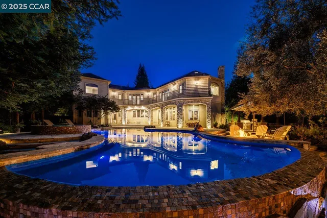 a front view of a building with fountain bath tub and barbeque oven