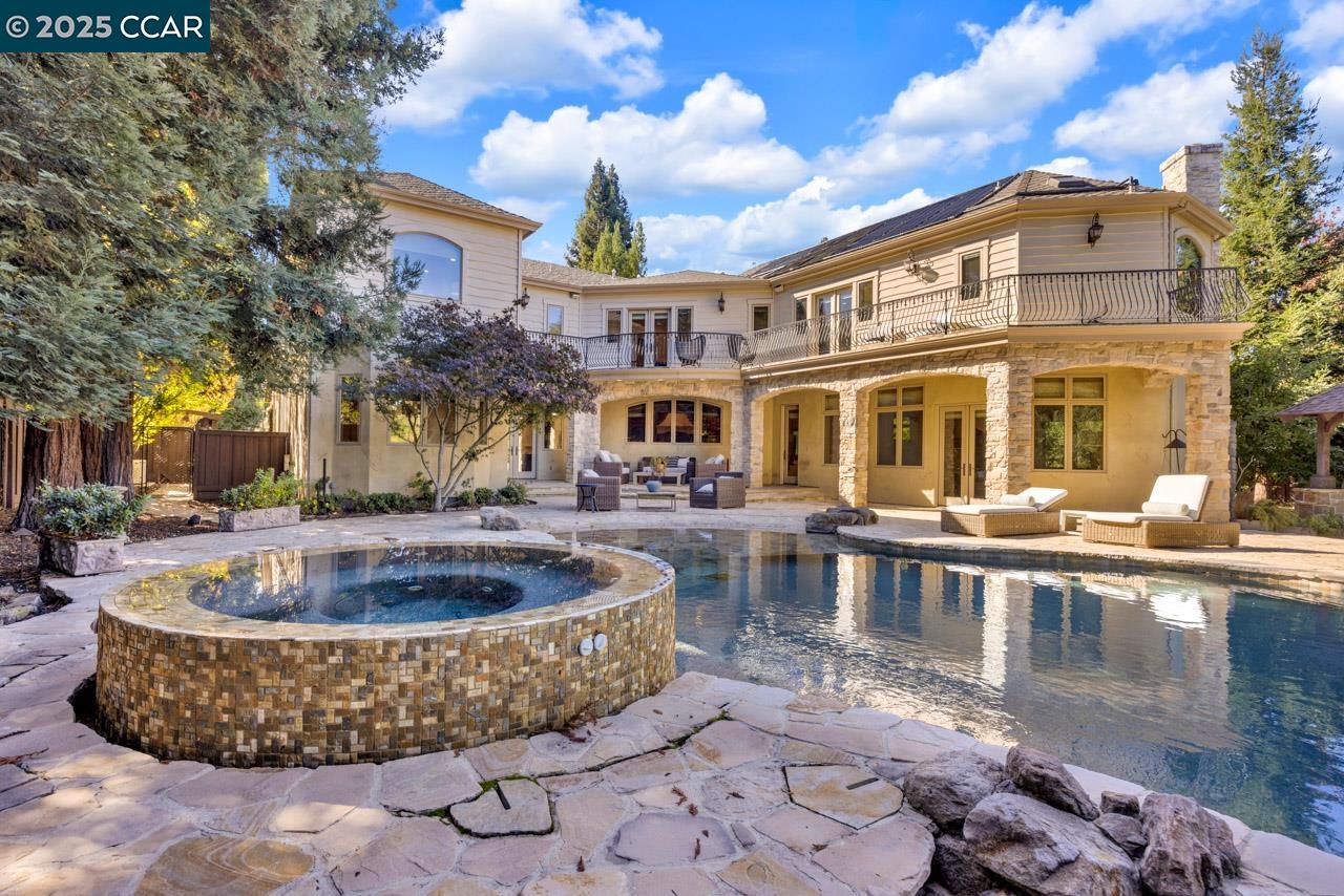 104 Muir Lane Alamo, CA 94507 - Photo 50 of 54 a front view of a building with fountain bath tub and barbeque oven