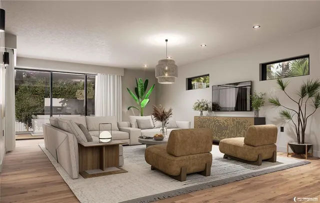 a view of a patio with table and chairs and potted plants