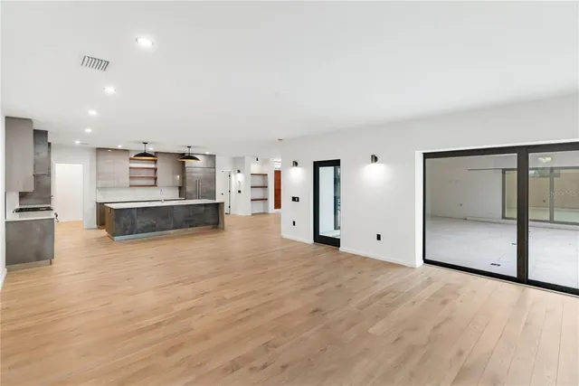 a white wall with a close up of a sink